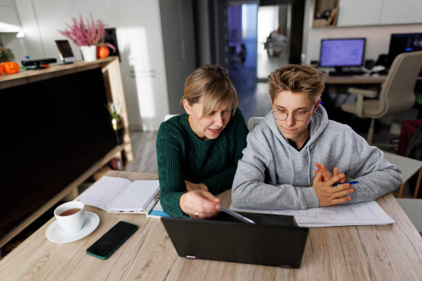Tutor and student reviewing a plan
